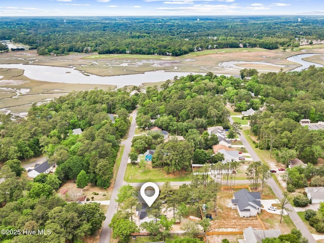 3122 Oak Dr SW, Shallotte, NC 28470 - aerial perspective of suburban area featuring a large body of water and a forest