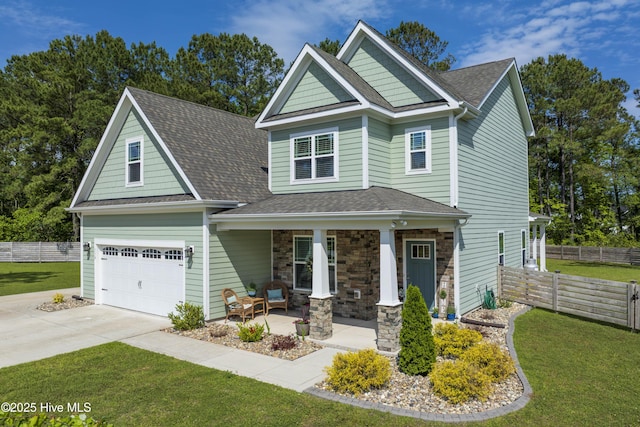 craftsman-style home with a porch, concrete driveway, and roof with shingles