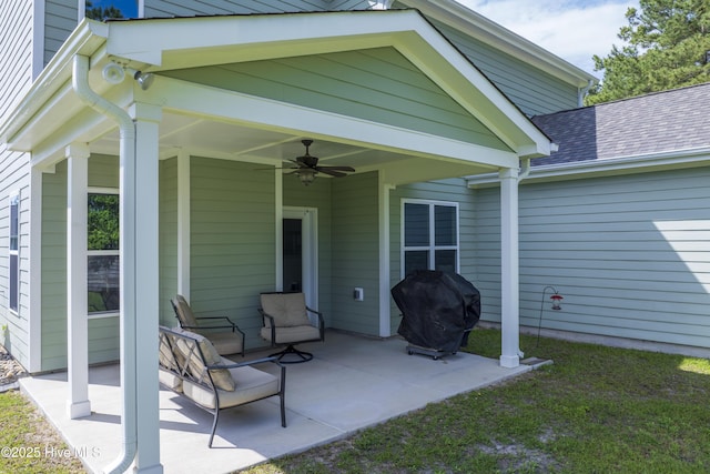 view of patio / terrace featuring area for grilling and ceiling fan
