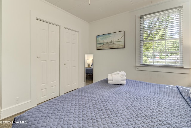 bedroom featuring ornamental molding