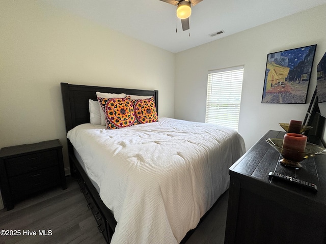 4983 Kona Ct Unit 1, Southport, NC 28461 - bedroom with wood finished floors and ceiling fan