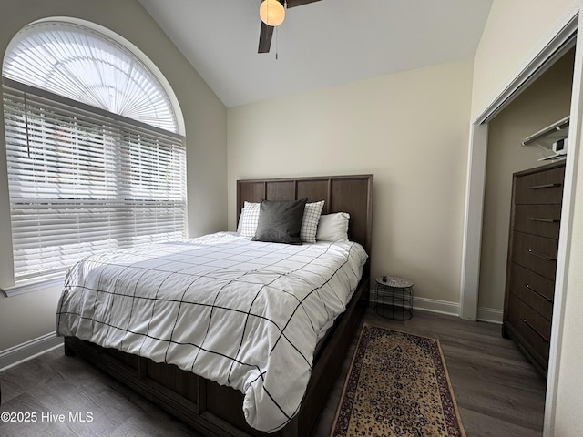 4983 Kona Ct Unit 1, Southport, NC 28461 - bedroom with vaulted ceiling, wood finished floors, baseboards, and ceiling fan