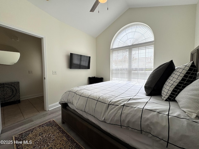 4983 Kona Ct Unit 1, Southport, NC 28461 - bedroom with lofted ceiling, wood finished floors, baseboards, and ceiling fan