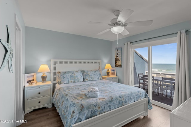 608 Carolina Beach Ave N Unit 3C, Carolina Beach, NC 28428 - bedroom with access to exterior, dark wood-style flooring, a water view, and ceiling fan
