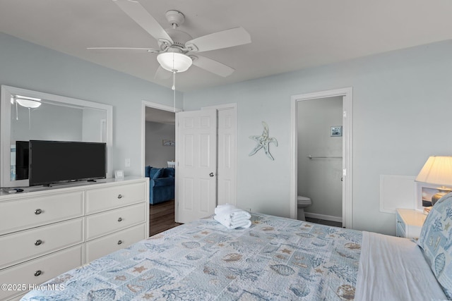 608 Carolina Beach Ave N Unit 3C, Carolina Beach, NC 28428 - bedroom featuring ensuite bath and a ceiling fan