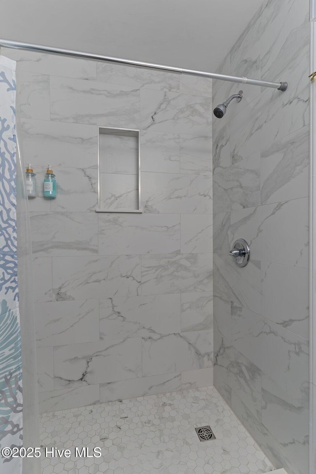 608 Carolina Beach Ave N Unit 3C, Carolina Beach, NC 28428 - bathroom featuring tiled shower