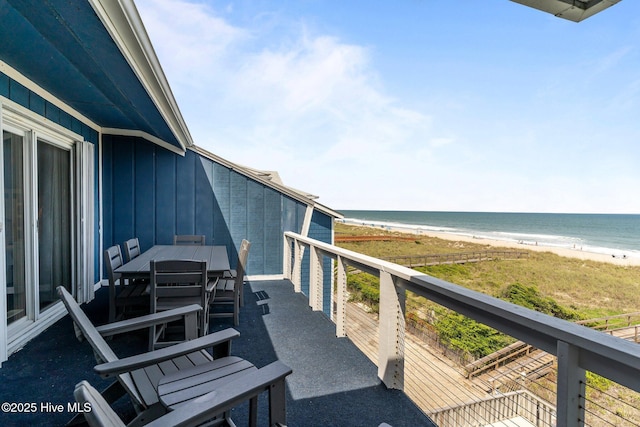 608 Carolina Beach Ave N Unit 3C, Carolina Beach, NC 28428 - balcony featuring view of water and beach and outdoor dining space