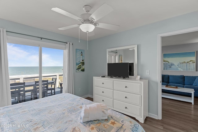 608 Carolina Beach Ave N Unit 3C, Carolina Beach, NC 28428 - bedroom with baseboards, wood finished floors, access to outside, and ceiling fan