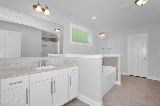 full bath featuring vanity, a garden tub, baseboards, tile patterned flooring, and a shower