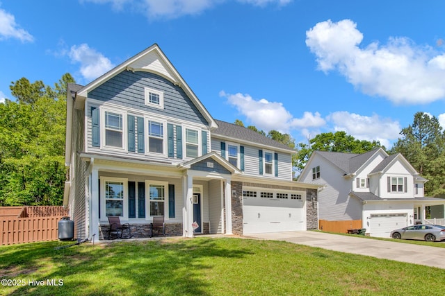 craftsman inspired home with driveway, a porch, stone siding, and a garage