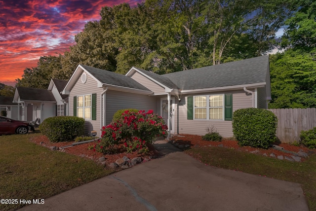 100 Sycamore Ln, Elizabeth City, NC 27909 - ranch-style house featuring fence and a shingled roof