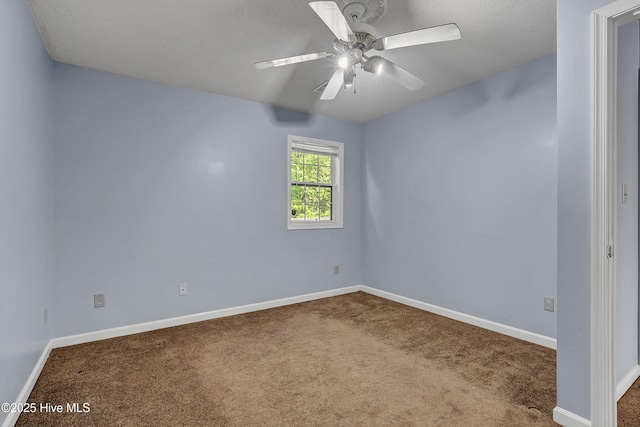 100 Sycamore Ln, Elizabeth City, NC 27909 - empty room with carpet floors, a ceiling fan, and baseboards