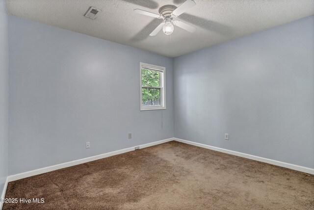100 Sycamore Ln, Elizabeth City, NC 27909 - unfurnished room featuring carpet, a textured ceiling, ceiling fan, and baseboards