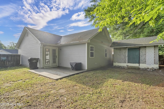100 Sycamore Ln, Elizabeth City, NC 27909 - rear view of property with roof with shingles and a patio