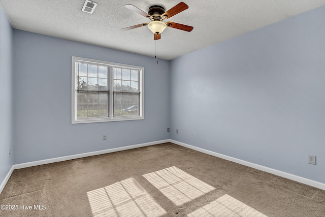 100 Sycamore Ln, Elizabeth City, NC 27909 - carpeted spare room featuring ceiling fan, a textured ceiling, and baseboards