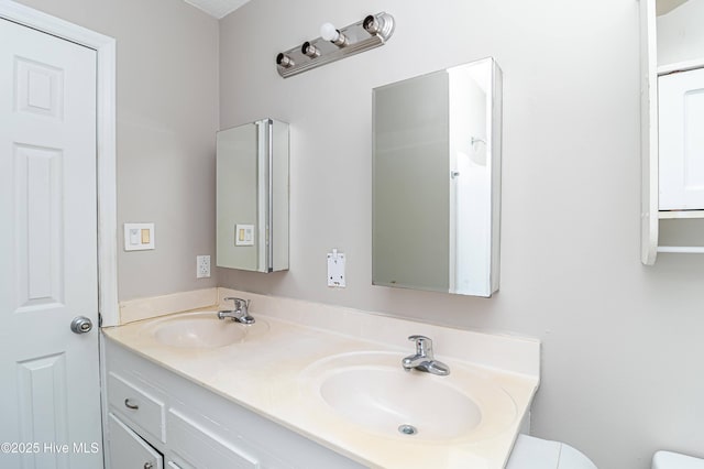 204 Fox Dr, Dudley, NC 28333 - bathroom featuring toilet and double vanity