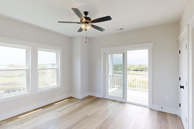 130 Sea Oaks Ct, North Topsail Beach, NC 28460 - unfurnished room featuring plenty of natural light, light wood-style floors, and baseboards