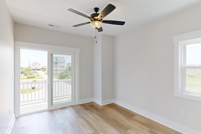 130 Sea Oaks Ct, North Topsail Beach, NC 28460 - empty room featuring light wood-style floors, a ceiling fan, and baseboards