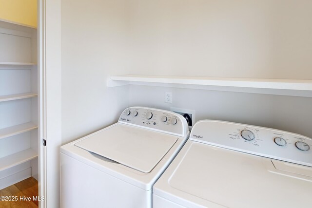 130 Sea Oaks Ct, North Topsail Beach, NC 28460 - clothes washing area featuring washing machine and dryer and wood finished floors