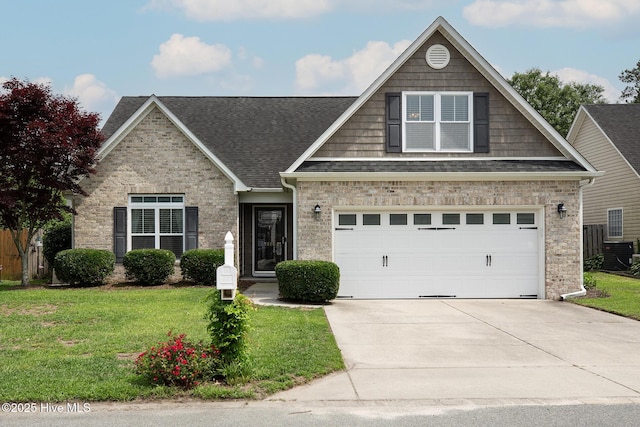 7810 Olde Pond Rd, Wilmington, NC 28411 - view of front of home featuring concrete driveway, roof with shingles, a front yard, cooling unit, and a garage