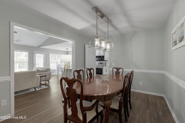 7810 Olde Pond Rd, Wilmington, NC 28411 - dining space featuring dark wood-style floors and baseboards