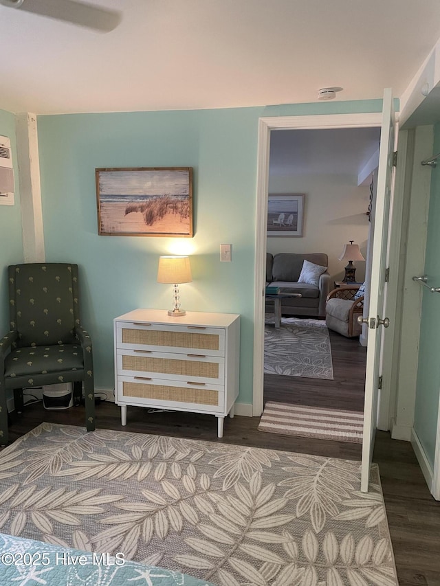 129 NE 36th St, Oak Island, NC 28465 - bedroom with wood finished floors and baseboards