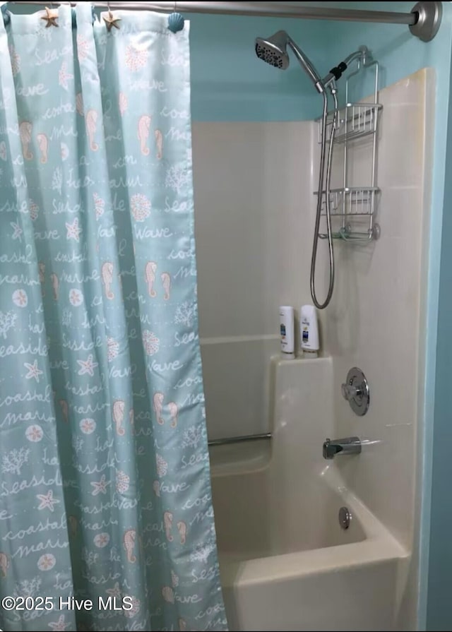 129 NE 36th St, Oak Island, NC 28465 - full bath featuring shower / tub combo