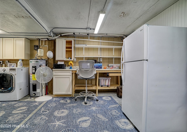 129 NE 36th St, Oak Island, NC 28465 - below grade area featuring freestanding refrigerator, washer / clothes dryer, water heater, and an office area