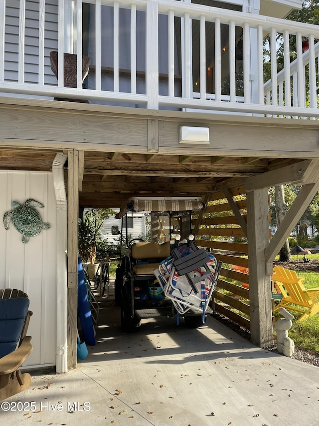 129 NE 36th St, Oak Island, NC 28465 - view of vehicle parking featuring driveway