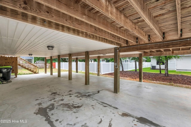 view of patio / terrace with fence and stairway