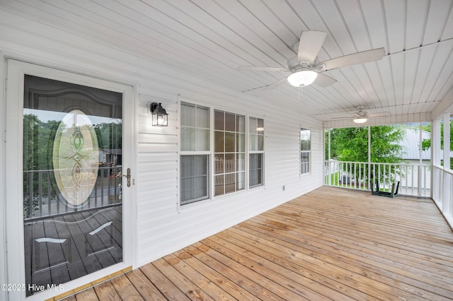 deck featuring a ceiling fan