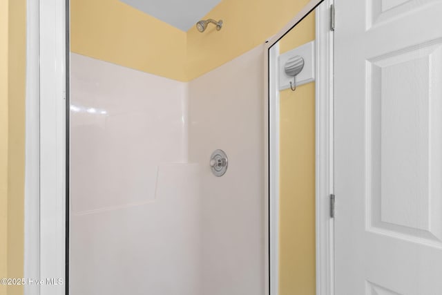 bathroom featuring a stall shower