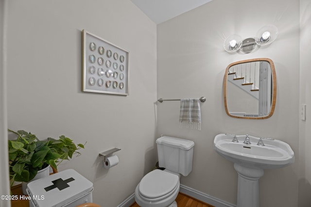 1005 Cambridge Ct, Trent Woods, NC 28562 - bathroom featuring toilet, baseboards, and wood finished floors