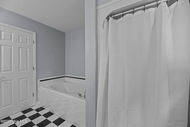 1005 Cambridge Ct, Trent Woods, NC 28562 - full bath featuring a garden tub, a textured ceiling, and tile patterned floors