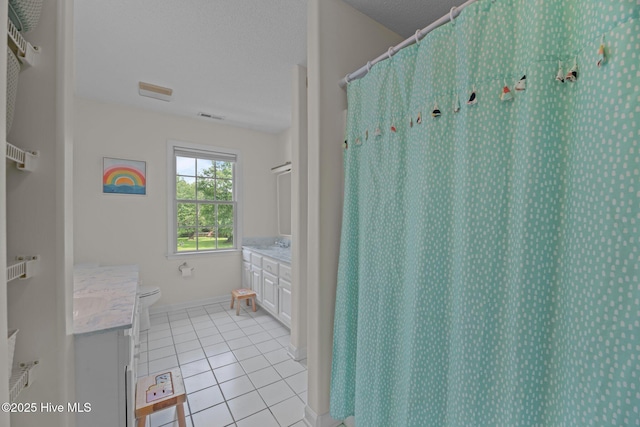1005 Cambridge Ct, Trent Woods, NC 28562 - full bathroom featuring vanity, tile patterned floors, toilet, and baseboards
