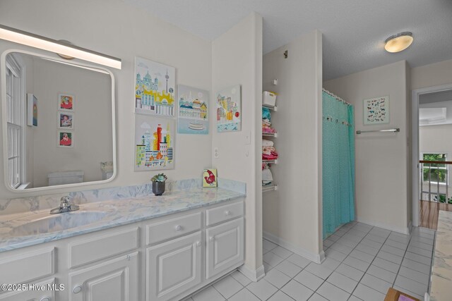1005 Cambridge Ct, Trent Woods, NC 28562 - full bathroom with tile patterned floors, vanity, and baseboards