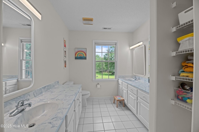 1005 Cambridge Ct, Trent Woods, NC 28562 - bathroom featuring vanity, tile patterned floors, toilet, baseboards, and a textured ceiling