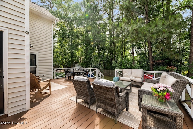 1005 Cambridge Ct, Trent Woods, NC 28562 - wooden deck featuring an outdoor living space, outdoor dining area, and view of scattered trees
