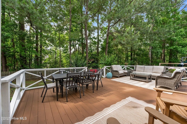 1005 Cambridge Ct, Trent Woods, NC 28562 - wooden deck with an outdoor living space, outdoor dining space, and view of scattered trees