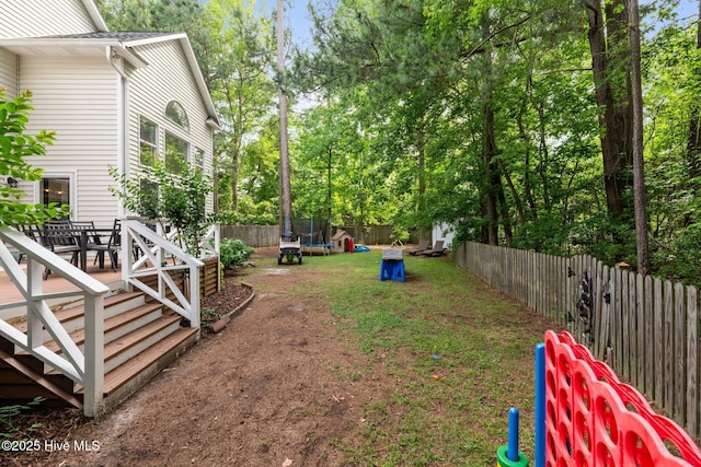 1005 Cambridge Ct, Trent Woods, NC 28562 - view of yard with a trampoline and outdoor dining area
