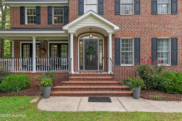 1005 Cambridge Ct, Trent Woods, NC 28562 - property entrance featuring brick siding and covered porch