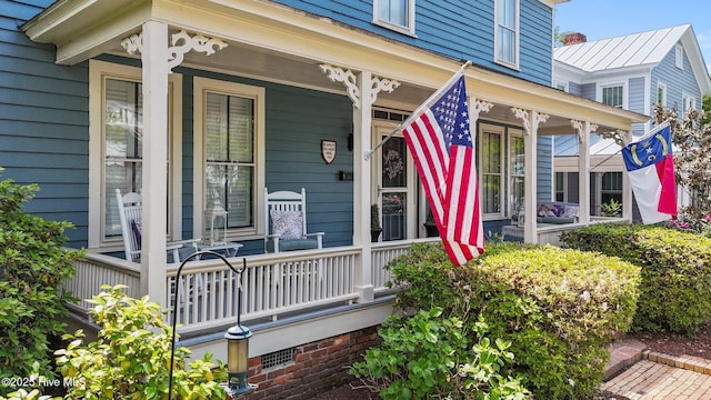 entrance to property with covered porch