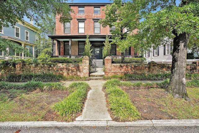 416 S Front St Unit 6, Wilmington, NC 28401 - view of front facade with a porch and brick siding