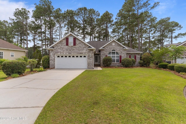 traditional-style house with driveway, an attached garage, a front yard, and brick siding