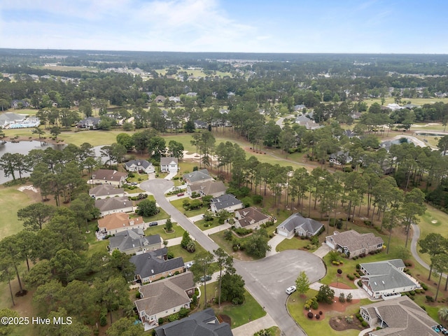 view of property location with nearby suburban area and a nearby body of water