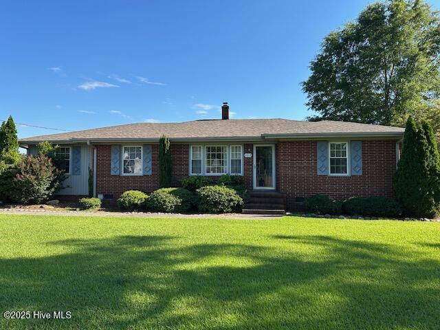 8019 W Tarboro Rd, Rocky Mount, NC 27803 - single story home with a front lawn, brick siding, and a chimney