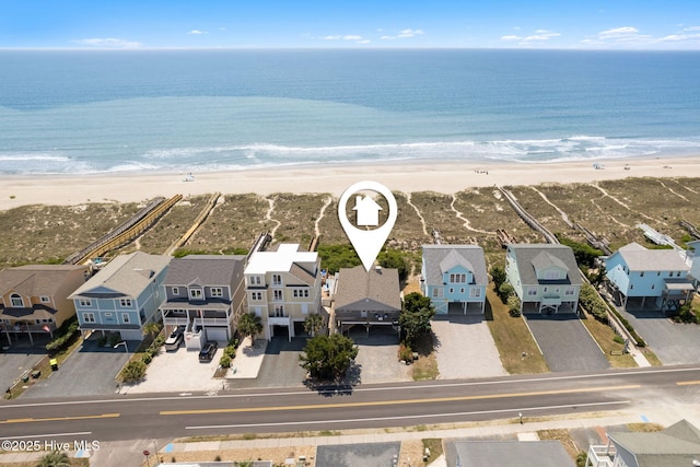 aerial perspective of suburban area with expansive coastline