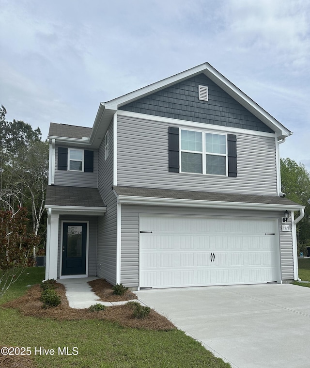 1571 Gate Hill Rd SE, Bolivia, NC 28422 - traditional home with a garage and concrete driveway