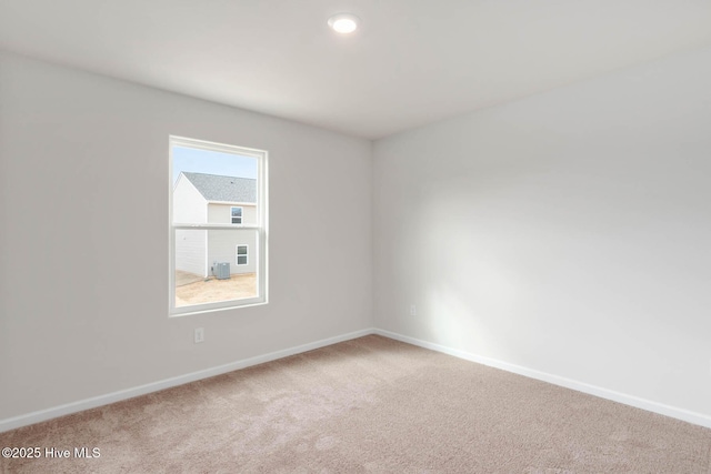1571 Gate Hill Rd SE, Bolivia, NC 28422 - spare room featuring baseboards and carpet