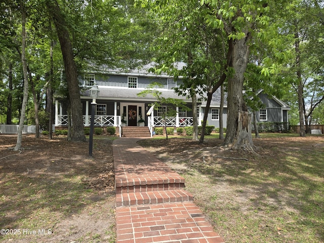 112 Brookview Dr, Jacksonville, NC 28540 - view of front of home featuring a porch and fence